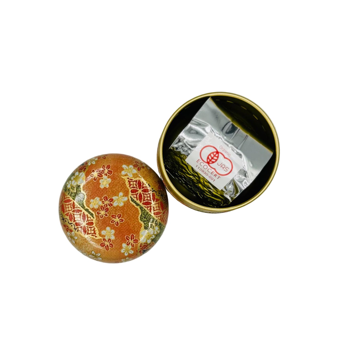 Decorative round container with floral design on a white background